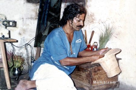 Mumbiram, at the desk Mumbiram